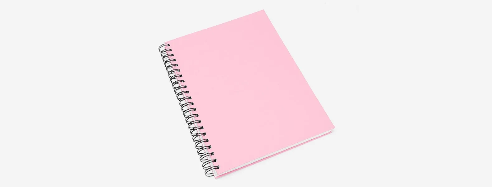 Caderno para anotações wire-o rosa com capa dura revestida em percalux linho. Conta com folha para dados pessoais, calendário e 100 folhas pautadas. Gramatura da folha de 70 g/m2.