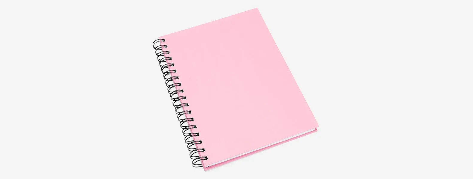 Caderno para anotações wire-o rosa com capa dura revestida em percalux linho. Conta com folha para dados pessoais, calendário e 100 folhas pautadas. Gramatura da folha de 70 g/m2