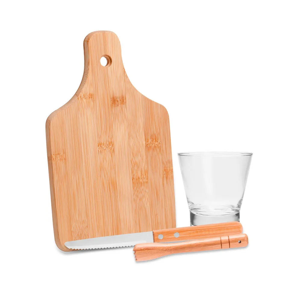 Kit para caipirinha. Conta com tábua e socador em bambu; faca para frutas de 4” em aço inox e copo de vidro 350ml.