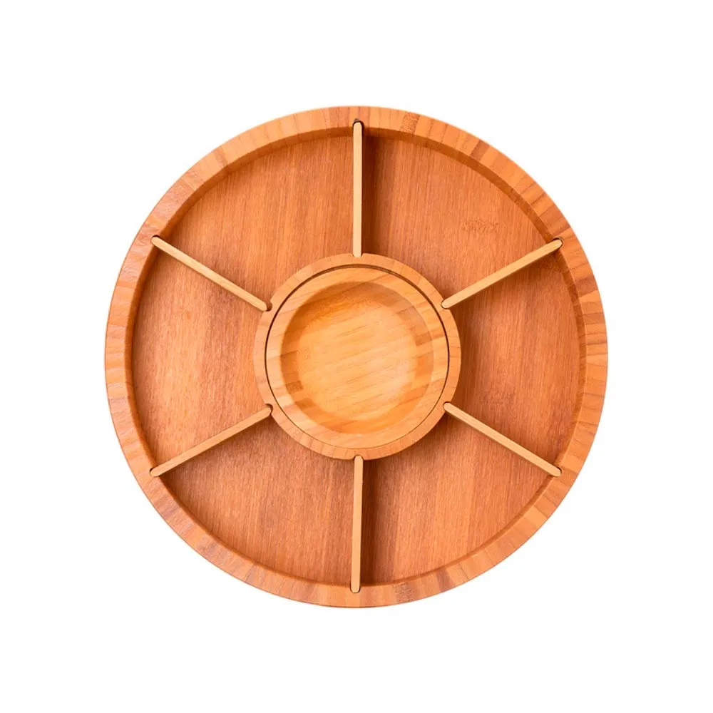 Petisqueira giratória em bambu. Conta com seis divisórias, com placas removíveis, e um bowl para molhos e patês.