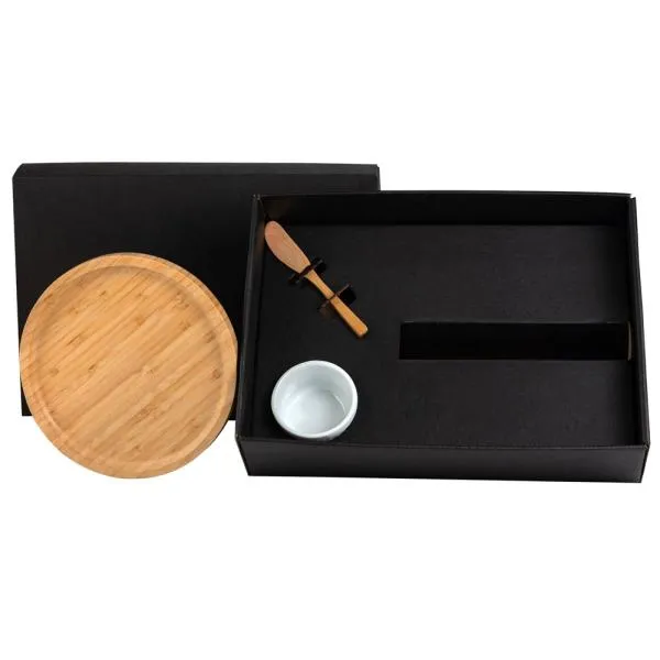 Kit para petisco. Conta com petisqueira e espátula em bambu; ramekin em porcelana.